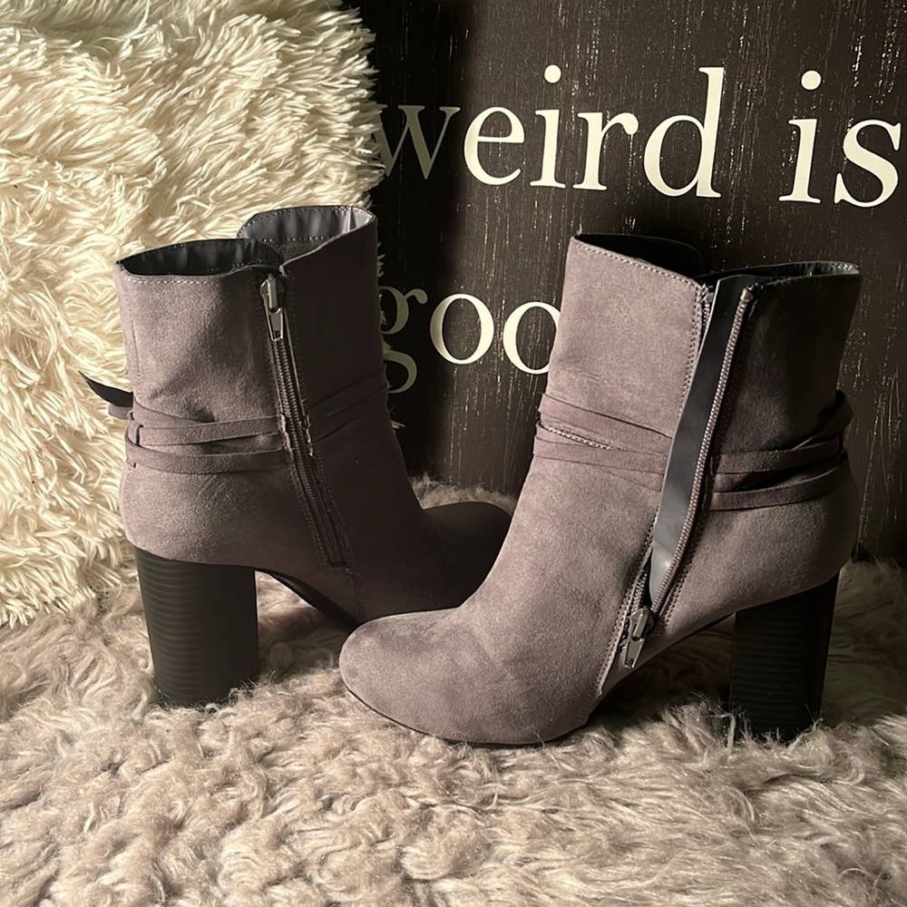 Never worn boats (Payless) suede finish with heel,zips up on side size 8 -8 1/2